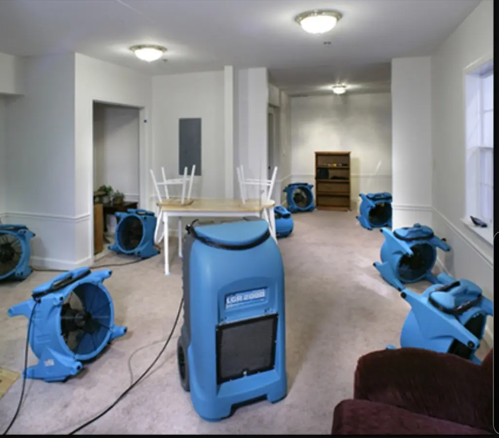 Air movers and dehumidifier setup for Water Damage Restoration in Joplin